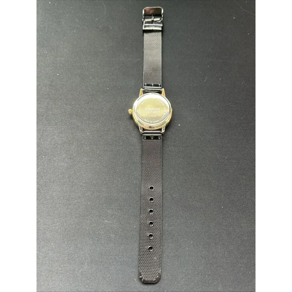 American Exchange Gold Tone Case Black Dial And Bezel Women’s Quartz Watch